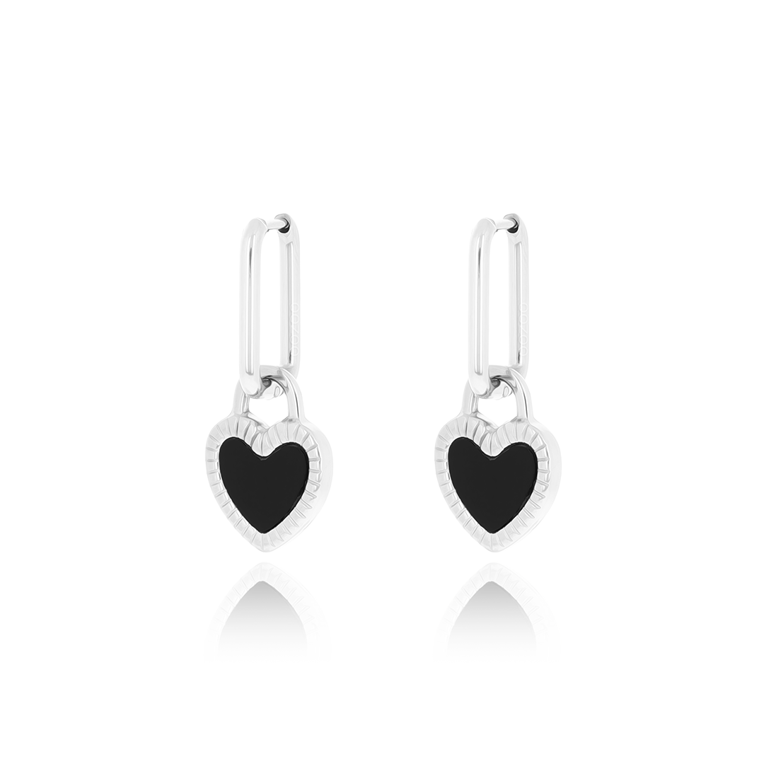 Silver coloured earrings with black & white heart charm
